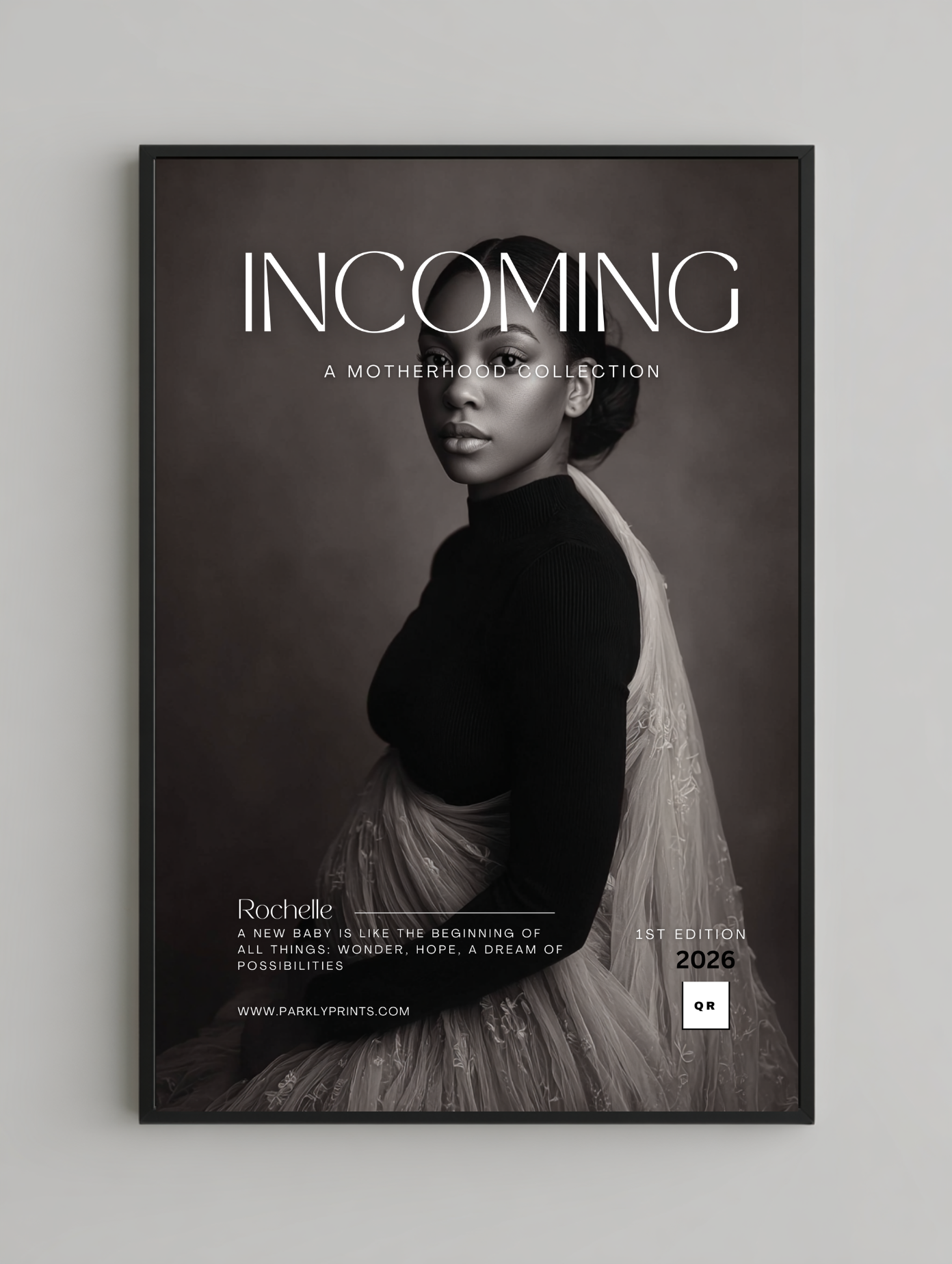 Framed poster with a black and white portrait of a woman and text 'INCOMING' on a gray background.